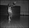 Photograph: [Willie Davis passing basketball]