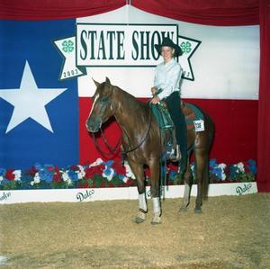 Primary view of object titled '[4-H girl riding a horse]'.