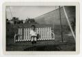 Photograph: [Johnny Cuellar on bench swing]