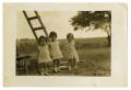 Photograph: [Three girls in field]