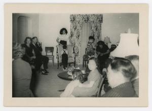 Primary view of object titled '[Cuellar family gathering in living room]'.
