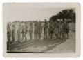 Photograph: [Bob Cuellar and other boys in a line]
