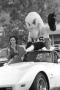 Photograph: ["Eppy" riding in the Homecoming Parade, 3]