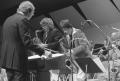 Photograph: [Photograph of Neil Slater and Two Saxophonists]