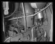 Photograph: [XH-40 engine showing cannon connections]