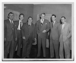Primary view of object titled '[Kenton with group of men]'.