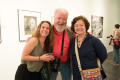 Photograph: [Exhibition Attendees Smile for Photos]
