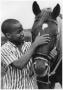 Photograph: [North Texas Homecoming, Boy and horse]