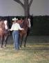 Primary view of [Carol Ramsay with two horses]