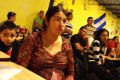 Photograph: [People listening to a speaker at the El Salvador Restaurant]