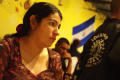 Photograph: [A woman in the El Salvador Restaurant]