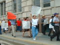 Thumbnail image of item number 1 in: '[Signs in Spanish and English are carried by protesters]'.