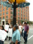 Thumbnail image of item number 1 in: '[Protesters carry signs at the corner of North Houston and Elm Streets]'.