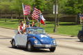 Primary view of [Male protesters in blue and white Volkswagen Beetle]
