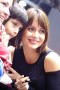Photograph: [Gabriela with young fan]