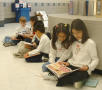 Photograph: [Students read to one another at Seminary Hills Elementary]