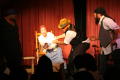 Photograph: [Costumed Cast Performing]