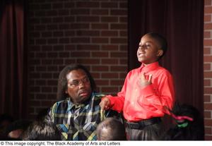 [Curtis King on Stage with Young Performer]