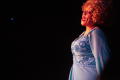 Photograph: [Actress performing in blue dress]