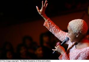 Primary view of object titled '[Chrisette Michele singing]'.