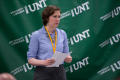 Thumbnail image of item number 1 in: '[Sarah Lippincott in front of UNT Banner]'.