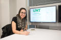Primary view of [Woman Smiling for Photo at UNT's New College]