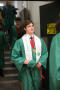 Primary view of [Undergraduate Student Wearing Talons Sash at his Commencement Ceremony]