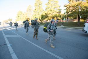[Photograph of Soldiers walking on Preview Day, 2]