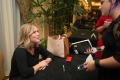 Photograph: [Sarah Hepola at signing table]