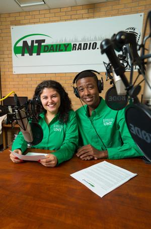 [Andrea Czobor and Trerell Hearn at broadcast desk]