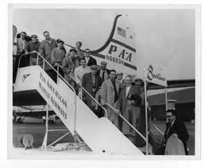 [Photograph of Stan Kenton and Orchestra Boarding a Plane]