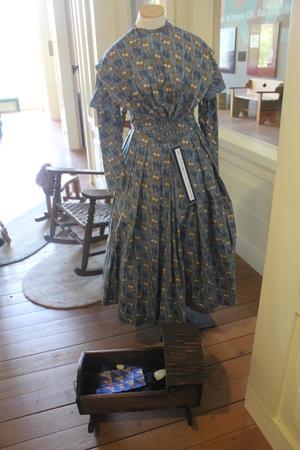 Primary view of object titled '[Dress in Oregon Trail exhibit]'.