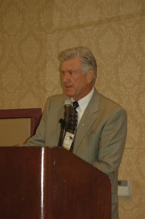 Primary view of object titled '[Speaker standing at podium during 2007 conference 2]'.