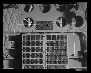 [Photograph of a control panel on the ceiling of a UH-1F Iroquois helicopter]