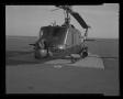 Photograph: [Photograph of a front view of a heavily armed UH-1C Iroquois helicop…
