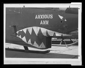 [Photograph of a helicopter with shark teeth nose art]