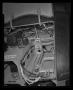 Thumbnail image of item number 1 in: '[Photograph of a view inside an open compartment of a UH-1B Iroquois helicopter]'.