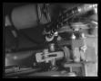 Photograph: [Photograph of a closeup of where the guns are attached to a UH-1B Ir…
