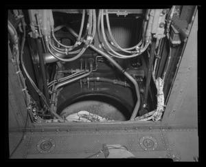 [Photograph of the wiring inside the wall of an aircraft]