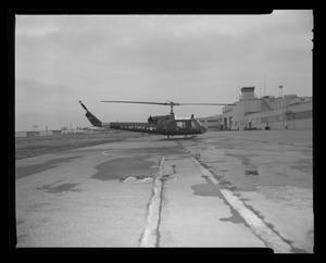 [Photograph of a UH-1F Iroquois helicopter parked on a concrete surface, 5]