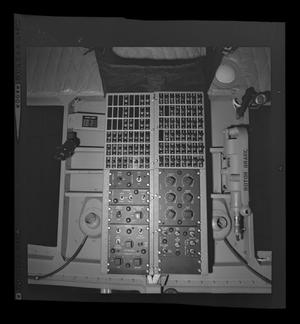 Primary view of [Photograph of controls on the ceiling of a UH-1E Iroquois helicopter, 3]