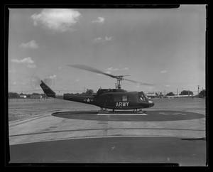 [Photograph of a side view of a UH-1C Iroquois helicopter facing the right, 2]