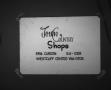 Photograph: [Advertisement Slide for 'Town and Country Shops']