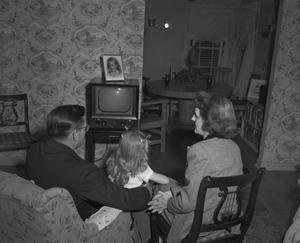 [A family watching television, 4]