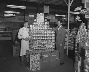 Primary view of object titled '[Two Men with Cans of "Ajax"]'.