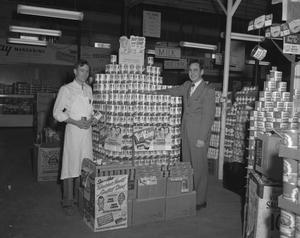 [Portrait of Two Men with Cans of "Ajax"]