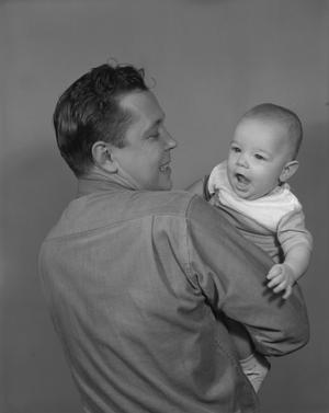 [Bill Guy Holding a Baby]