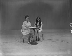Primary view of object titled '[Bobbie Wygant with female guest]'.