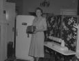 Primary view of [Woman Holding a Toaster]