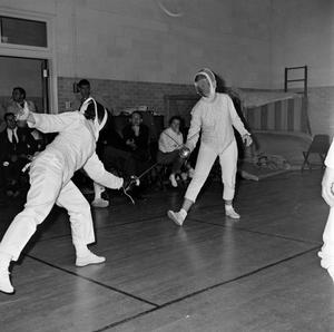 [Women fencing in Physical Education, 6]